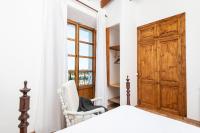 A bed or beds in a room at Sa Plana Nova