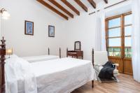 A bed or beds in a room at Sa Plana Nova