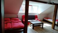 Postel nebo postele na pokoji v ubytování Apartmány Kukaččí hnízdo
