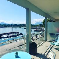 a balcony with a view of a marina at RESIDENCE DU PORT in Le Bourget-du-Lac