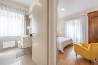 Posteľ alebo postele v izbe v ubytovaní A Luxury apartment at Cagliari Poetto Beachfront