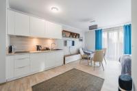 Kuchyňa alebo kuchynka v ubytovaní Apartamenty Sun & Snow Rezydencja Park
