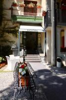 The facade or entrance of Le Querce Hotel
