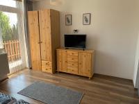 Telewizja i/lub zestaw kina domowego w obiekcie Borsi Apartman