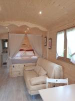 A bed or beds in a room at La diligenza