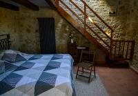 Łóżko lub łóżka w pokoju w obiekcie malandrino cottage