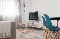 Telewizja i/lub zestaw kina domowego w obiekcie Apartment Aquamarine