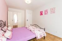 Łóżko lub łóżka w pokoju w obiekcie Apartment Aquamarine