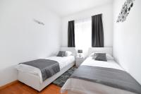 Posteľ alebo postele v izbe v ubytovaní Bellevue Hill apartment
