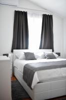 Posteľ alebo postele v izbe v ubytovaní Bellevue Hill apartment