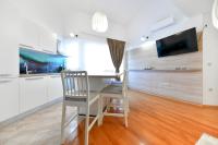 Televízia a/alebo spoločenská miestnosť v ubytovaní Bellevue Hill apartment