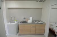 Comfort CUBE PHOENIX MIYAZAKIにあるキッチンまたは簡易キッチン