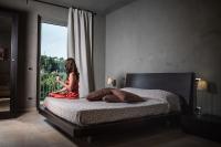 Posteľ alebo postele v izbe v ubytovaní Agriresort Villa Gelso- Adults Friendly