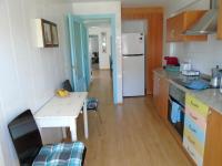 Kuchyň nebo kuchyňský kout v ubytování Lindo y acogedor Apartamento Grao Playa Gandia piso 5to sin ascensor