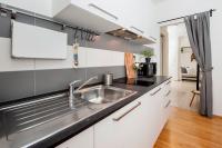 Kuchyň nebo kuchyňský kout v ubytování Apartment Mimi
