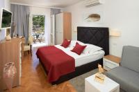 Posteľ alebo postele v izbe v ubytovaní Hotel Fortuna