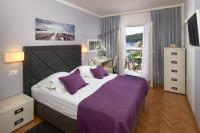 Posteľ alebo postele v izbe v ubytovaní Hotel Fortuna
