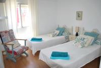 Postel nebo postele na pokoji v ubytování Lindo y acogedor Apartamento Grao Playa Gandia piso 5to sin ascensor