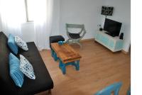 TV a/nebo společenská místnost v ubytování Lindo y acogedor Apartamento Grao Playa Gandia piso 5to sin ascensor