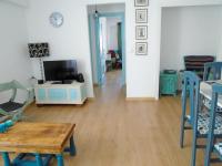 TV a/nebo společenská místnost v ubytování Lindo y acogedor Apartamento Grao Playa Gandia piso 5to sin ascensor