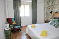 Postel nebo postele na pokoji v ubytování Lindo y acogedor Apartamento Grao Playa Gandia piso 5to sin ascensor
