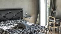 Posteľ alebo postele v izbe v ubytovaní Agriresort Villa Gelso- Adults Friendly