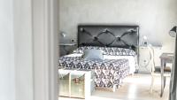 Posteľ alebo postele v izbe v ubytovaní Agriresort Villa Gelso- Adults Friendly