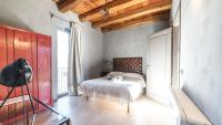 Posteľ alebo postele v izbe v ubytovaní Agriresort Villa Gelso- Adults Friendly