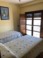 Posteľ alebo postele v izbe v ubytovaní La casa de Tita Elvira 4