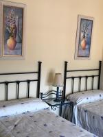 Posteľ alebo postele v izbe v ubytovaní La casa de Tita Elvira 4