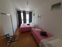 Posteľ alebo postele v izbe v ubytovaní Apartment Nido Stazione