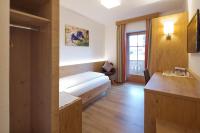 Posteľ alebo postele v izbe v ubytovaní Gästehaus Brantlhof Zimmer und Ferienwohnungen in Going am Wilden Kaiser