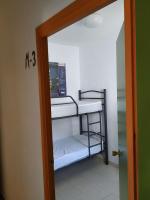 Posteľ alebo postele v izbe v ubytovaní Albergue de San Jose