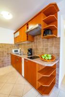 Kuchyň nebo kuchyňský kout v ubytování Villa Magnolija