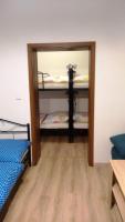 Postel nebo postele na pokoji v ubytování Apartmány Kukaččí hnízdo