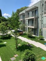 A garden outside HT Hotel Trieste