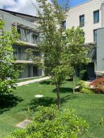 A garden outside HT Hotel Trieste