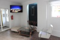 A television and/or entertainment centre at Hostal Baleàric
