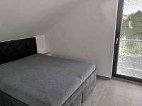 Postel nebo postele na pokoji v ubytování Apartmán Starovičky 406