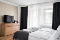 Postel nebo postele na pokoji v ubytování Apartamenty, Boutique Rooms Villa 82, MIEJSCE PRKINGOWE