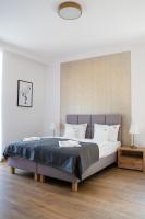 Postel nebo postele na pokoji v ubytování Apartamenty, Boutique Rooms Villa 82, MIEJSCE PRKINGOWE