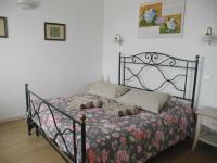 A bed or beds in a room at B&B Mimosa e Lillà