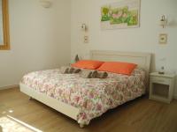 A bed or beds in a room at B&B Mimosa e Lillà