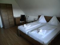 Łóżko lub łóżka w pokoju w obiekcie Hotel Familia