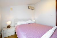 Łóżko lub łóżka w pokoju w obiekcie Lusi house
