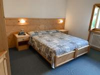 A bed or beds in a room at Residence Sci Sport