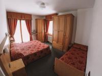A bed or beds in a room at Residence Sci Sport
