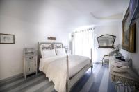 Łóżko lub łóżka w pokoju w obiekcie La Casa del Cuore