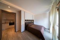 A kitchen or kitchenette at Blue Moon - Via Parigi Apartments