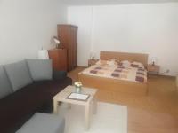 Postel nebo postele na pokoji v ubytování Apartmány Karlštejn